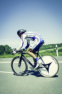 man riding road bike thumbnail