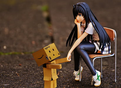 female anime character shaking hand with Amazon Danbo cardboard thumbnail