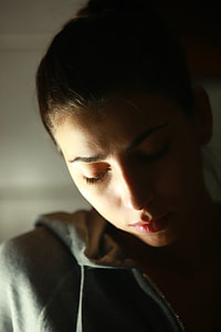 macro shot of woman wearing gray hooded top thumbnail