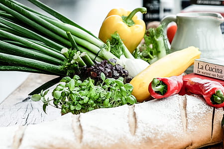 Assorted Vegetable and Bread on Brown Wooden Table thumbnail