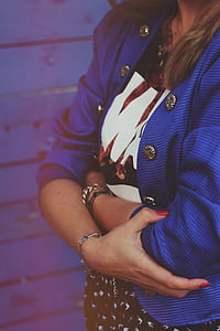 woman wearing blue jacket thumbnail