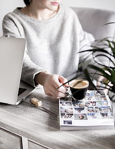 Photo of Woman Holding Clear Glass Mug thumbnail