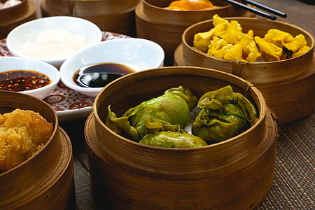 Chinese fried dim sum in wooden steamers thumbnail