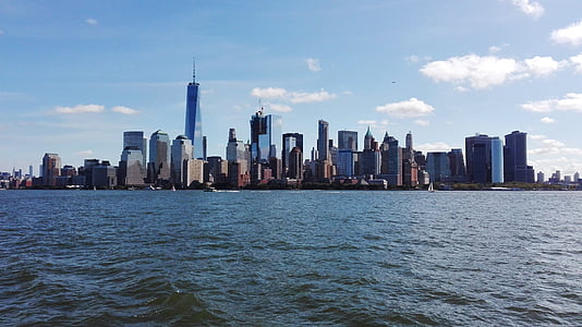 landscape photography of buildings near body of water thumbnail