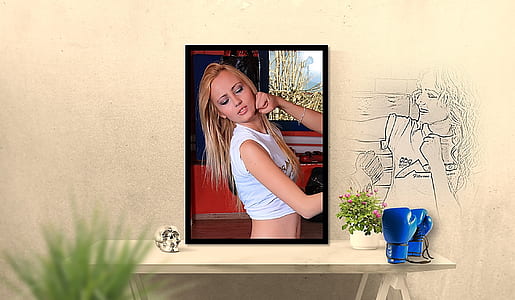 woman wear white cap-sleeved shirt photo on top of shelf thumbnail