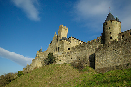 gray concrete castle under blue sky at daytime thumbnail