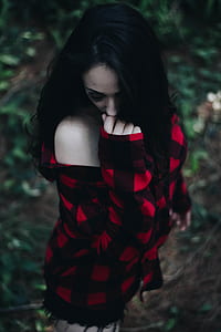 woman wearing red and black plaid long-sleeved shirt thumbnail