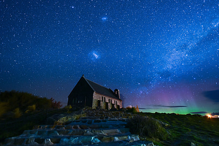 brown and black cabin during night with Northern Lights phenomenon thumbnail