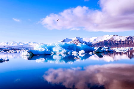 snow mountain near body of water thumbnail