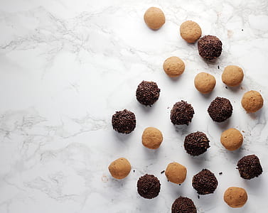 bunch of round pastries on white surface thumbnail