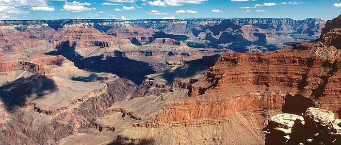 aerial photography of canyon under blue sky thumbnail