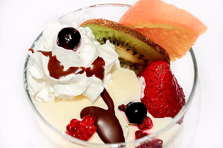 bowl of sliced fruits with ice cream thumbnail