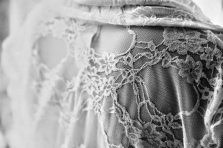 person wearing lace top thumbnail