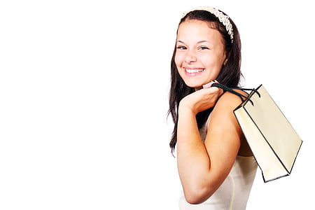 woman in white tank top holding white handbag thumbnail