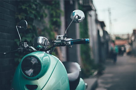 green motor scooter thumbnail