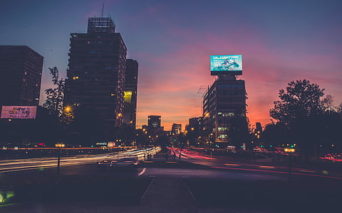time-lapse photography of busy road in city thumbnail
