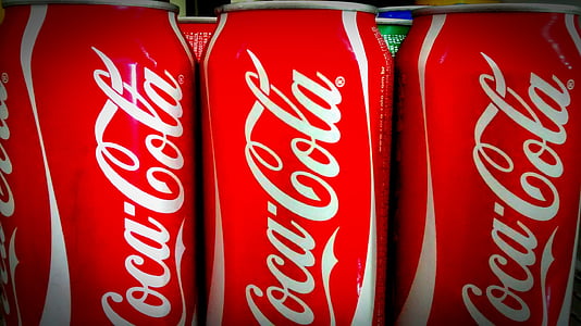 three Coca-Cola soda cans thumbnail