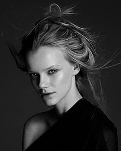 grayscale photo of woman wearing one-shoulder top thumbnail