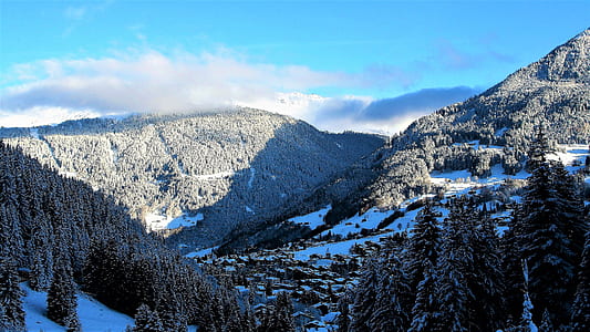 gray mountains near body of water thumbnail