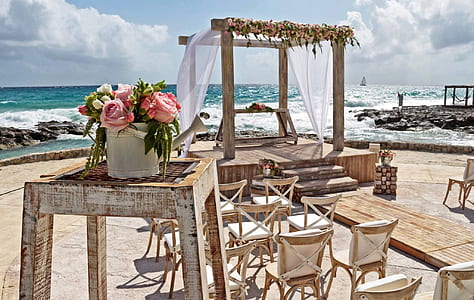 organized chairs beside body of water thumbnail