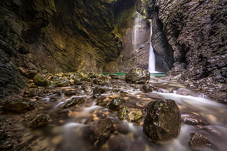 close up photography of running water at daytime thumbnail