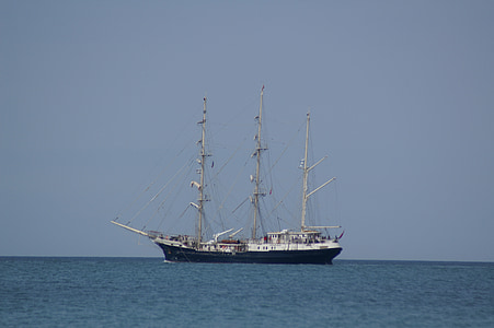 black and white galleon boat on body of water thumbnail