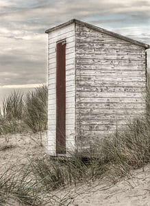 photo of white and brown wooden shed thumbnail