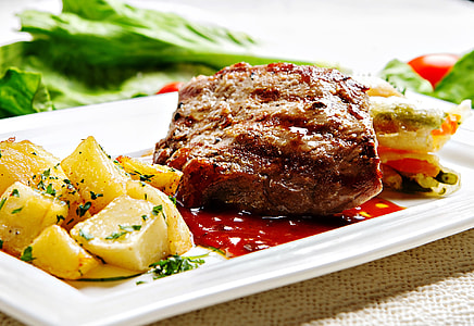 meat and vegetable dishes in white ceramic plate thumbnail