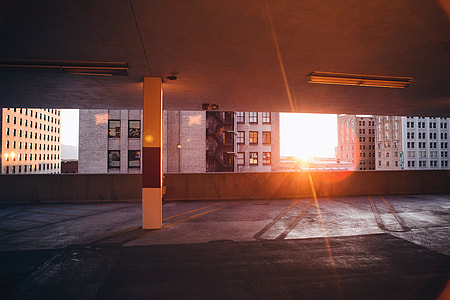 high rise building near sunset thumbnail