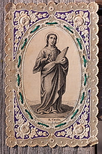 religious woman graphic mat on brown wooden surface thumbnail