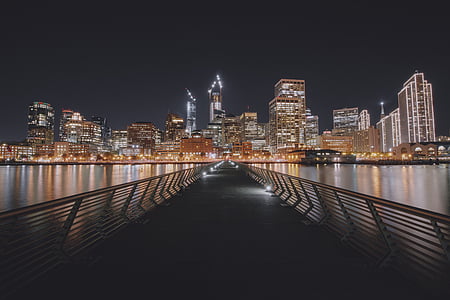 city buildings near body of water thumbnail