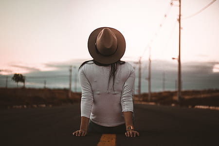 woman sitting on road thumbnail