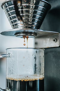 shallow focus photography of glass mug filled with coffee thumbnail