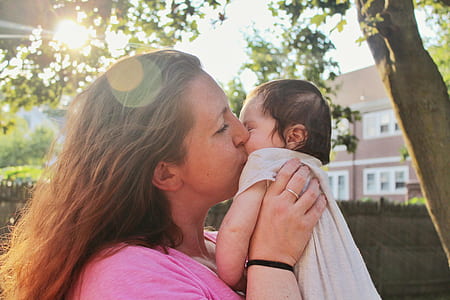 woman kissing baby thumbnail