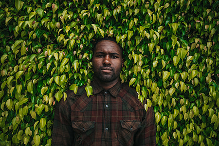 man wearing red plaid button-up shirt thumbnail