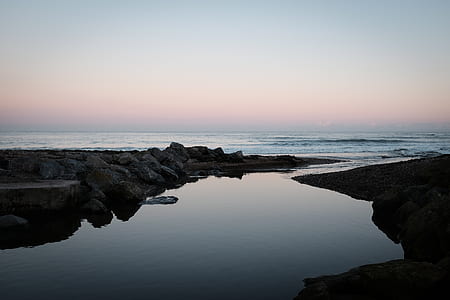 body of water during daytime thumbnail