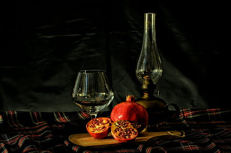 clear wine glass on brown wooden board thumbnail