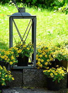 gray plant pot stand on garden thumbnail