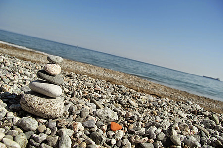 stacked stones near shore thumbnail