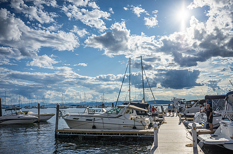 white speed boat lot on dock thumbnail