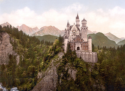 shallow focus photography of cathedral on peak of mountain thumbnail