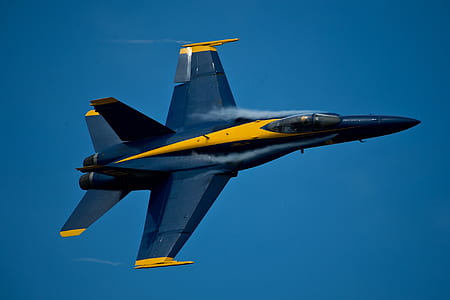 timelapse photo of a blue and yellow jet fighter thumbnail