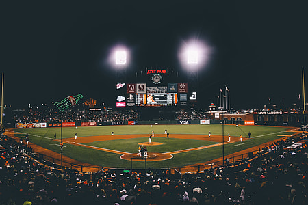 baseball player playing on baseball field surrounded with watching people thumbnail