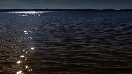 body of water near mountain thumbnail