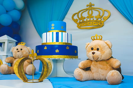two brown bear plush toys placed near 3-tier birthday cake thumbnail