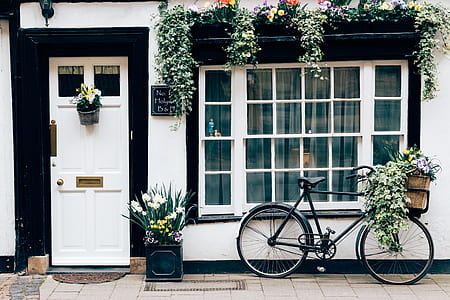 black road bike near window thumbnail