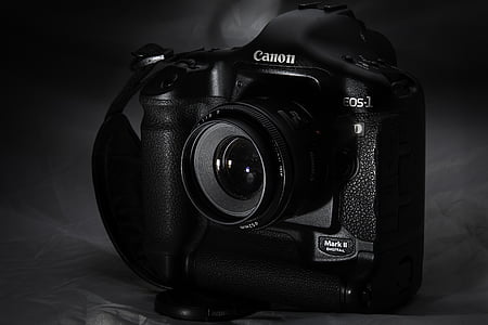 black Canon EOS camera thumbnail