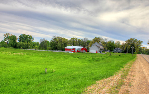 Farmhouse and barn in the landscape in Southern Wisconsin thumbnail