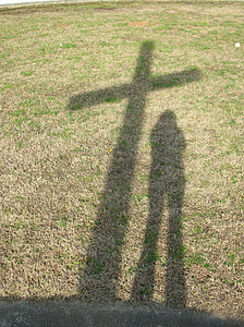 shadow of cross and person thumbnail