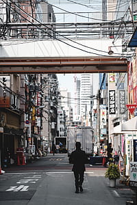 person walking under the bridge thumbnail